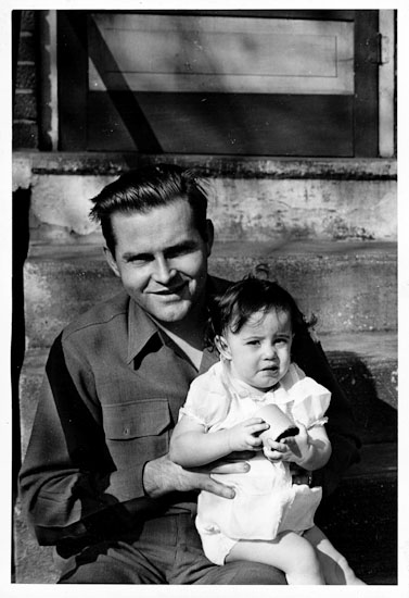 Harold at home with his daughter.